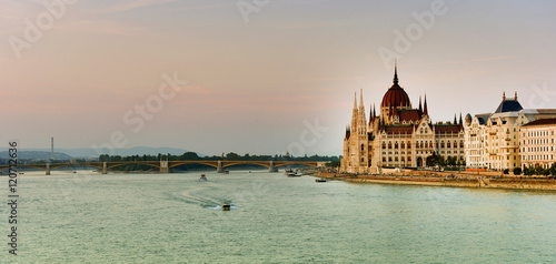 Budapest parliament at sunset near the Danube river © salajean