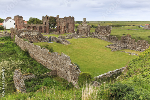 Lindisfarne Priory, early Christian site, and village, elevated view, Holy Island, Northumberland Coast