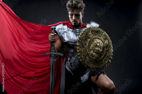 Fototapeta Conqueror, centurion or Roman warrior with iron armor, military