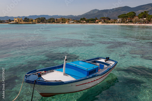 Traditional colourful fishing boat moored at the seaside resort of Mondello, Sicily, Mediterranean photo