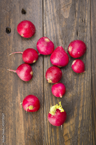 overhead shoot of radishes group on wood