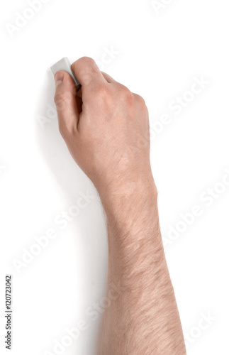 Close up view of a man's hand holding an eraser isolated on white background