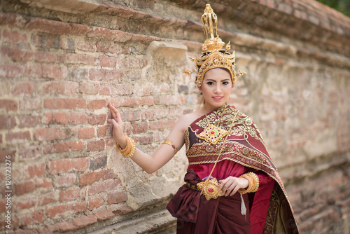 Beautiful portrait asian woman smile and wears thai dress