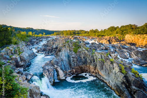View of rapids in the Potomac River at sunset, at Great Falls Pa photo