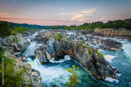 View of rapids in the Potomac River at sunset, at Great Falls Pa photo