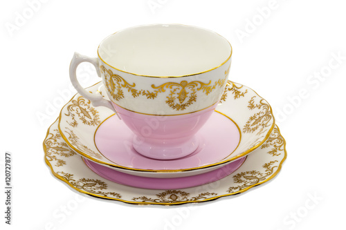 Antique china tea cup and small cake plate.