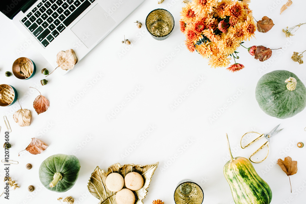 autumn fall flat lay, top view home office table desk. workspace with laptop, chrysanthemum bouquet, pumpkin, leaves, scissors on white background, flat lay, top view autumn fall flat lay, top view home office table desk. workspace with laptop, chrysanthemum bouquet, pumpkin, leaves, scissors on white background, flat lay, top view