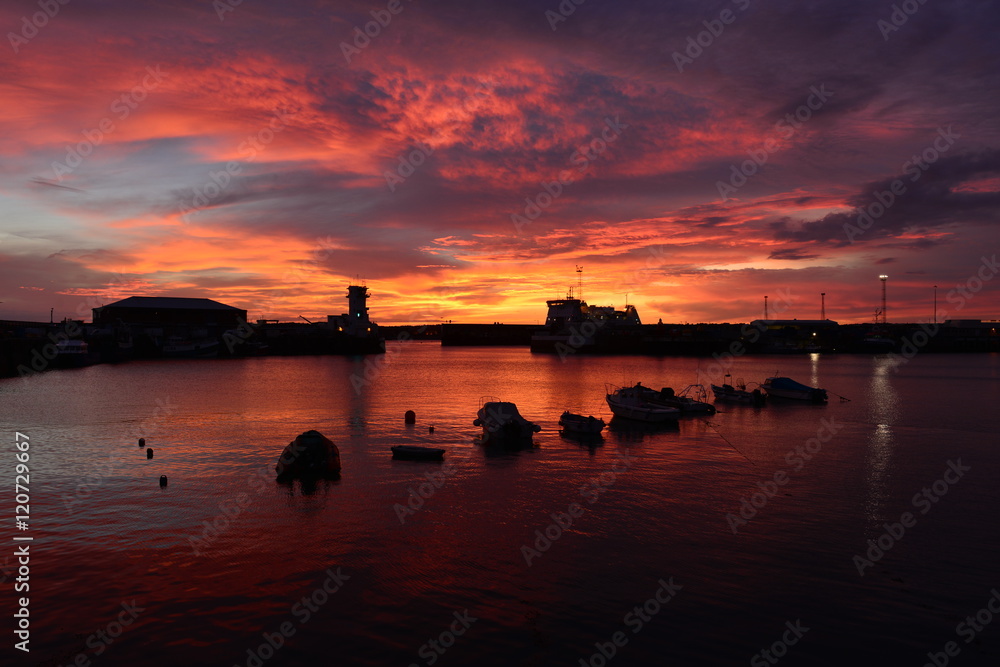 St.Helier harbour, Jersey, U.K.
Wide angle image of a Summer sunset with a high tide.