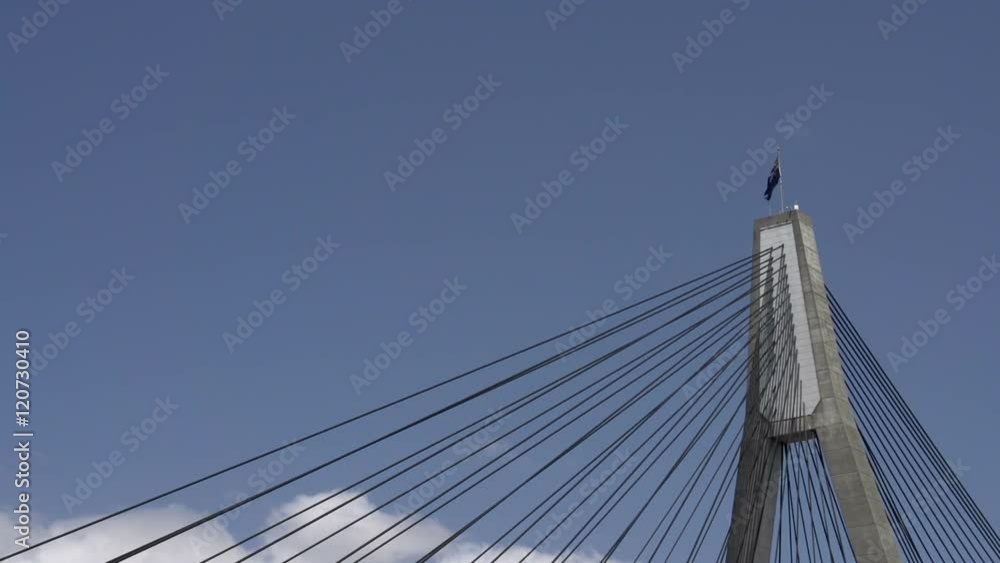 Top of the The ANZAC Bridge in Sydney with the Australian flag Top of the The ANZAC Bridge in Sydney with the Australian flag