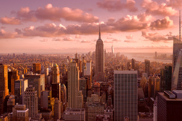 Fototapete New York Farbenfroher Sonnenuntergang über New York  © kmiragaya