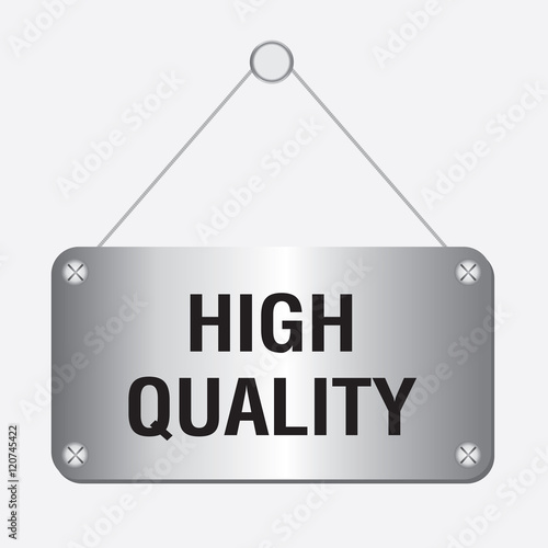 silver high quality sign hanging on the wall 