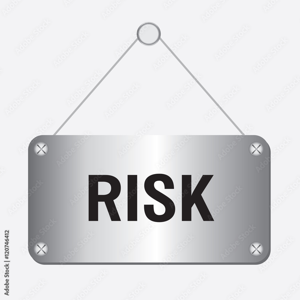 silver metallic risk sign hanging on the wall silver metallic risk sign hanging on the wall