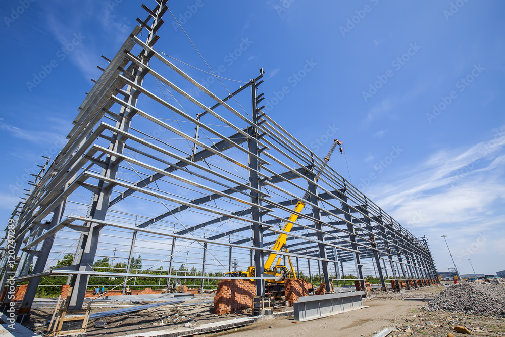 Fototapeta premium Construction site, steel frame structure is under construction