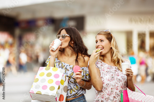 Beautiful young women enjoying shopping.