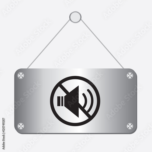 silver metallic no sound sign hanging on the wall