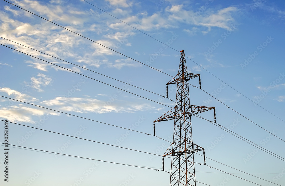 Electricity pylon against the blue sky background. Electricity pylon against the blue sky background.