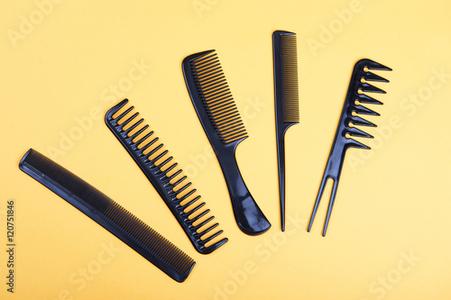 four black combs