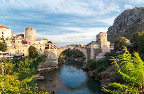 Beautiful landscape of the historic town of Mostar in the lights of the sunset, valley of the Neretva River