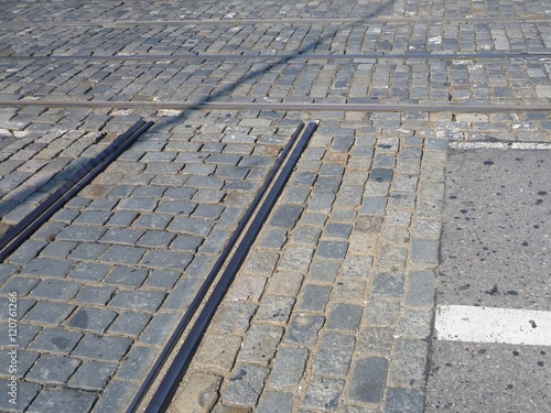 tram lines crossing on cobbles