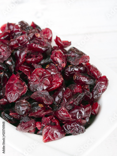 Dried cranberries in white bowl