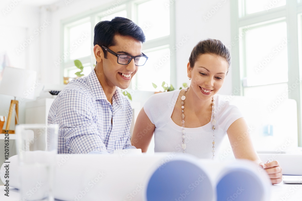 Two young architects in office Two young architects in office