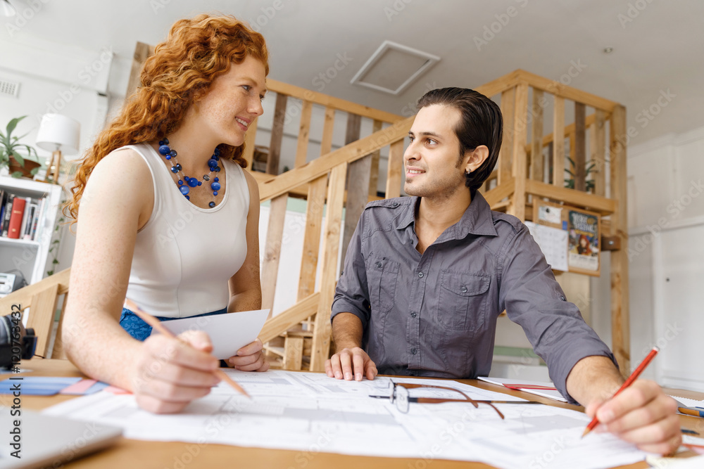 Two young architects in office Two young architects in office