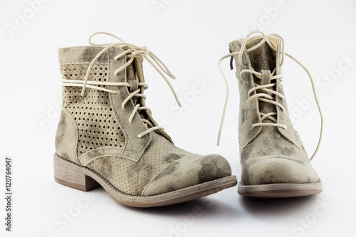 Pair of female grey grunge style boots