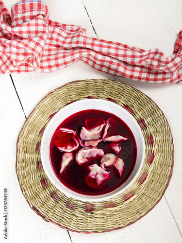 red borscht with dumplings - traditional Polish dish photo