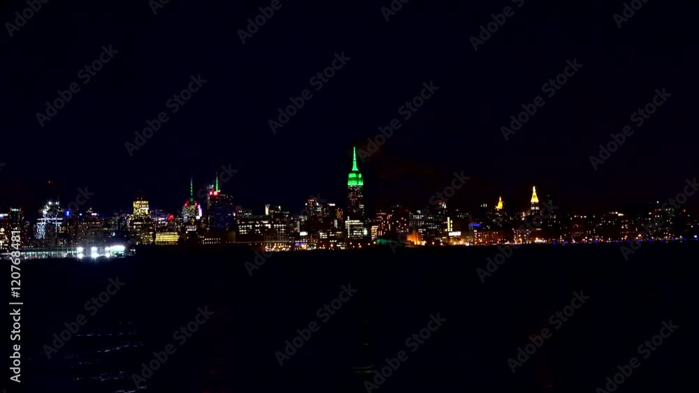 View of the Midtown Manhattan from Hoboken at night. NYC, USA. View of the Midtown Manhattan from Hoboken at night. NYC, USA.
