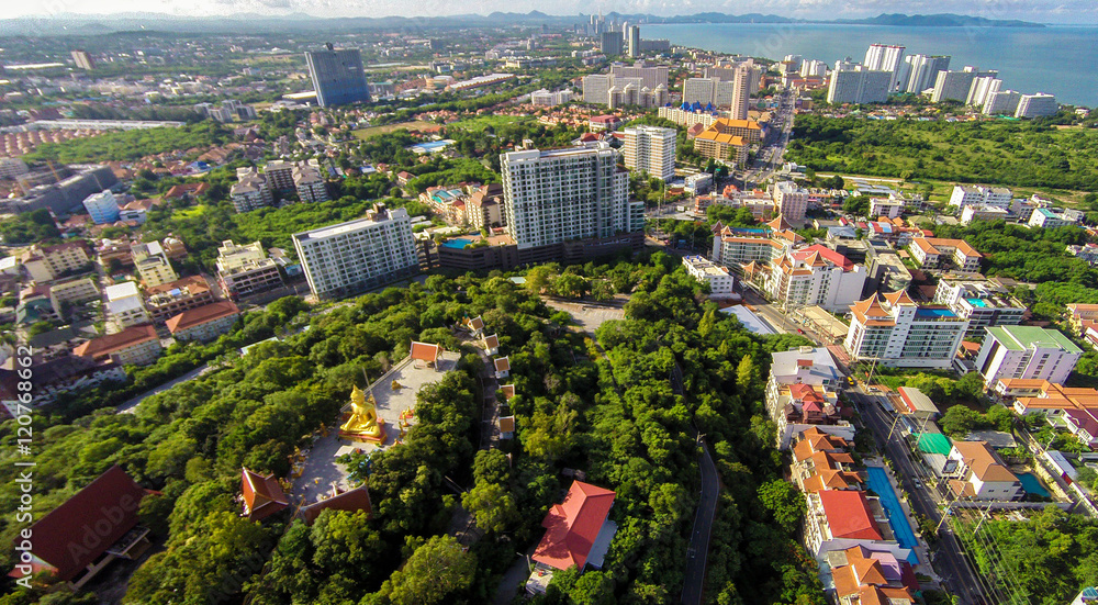 Aerial view of Pattaya, Thailand, including the Big Buddha statue atop the highest point of the city