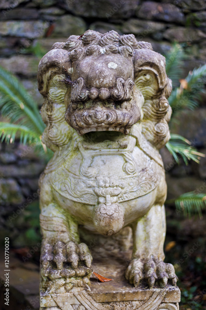 Asian stone dragon in garden. Asian stone dragon in garden.