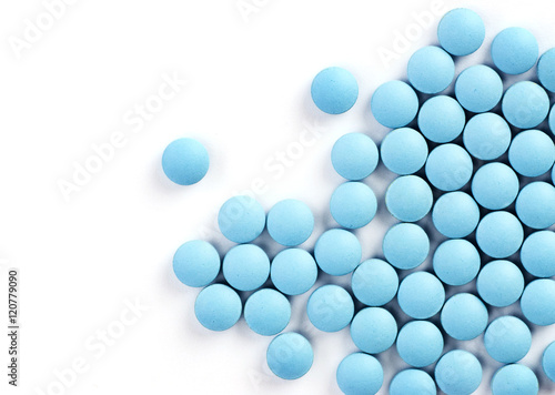 blue drugs on white background