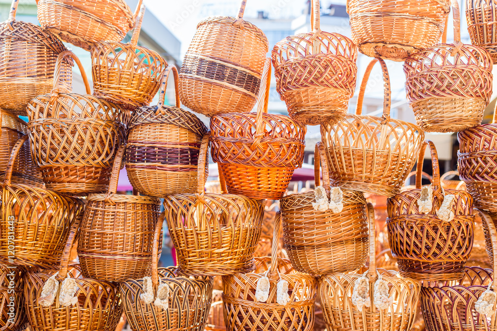 Pile of traditional handmade wicker baskets at street market