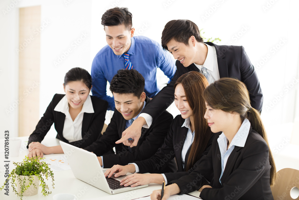 happy young business people working in office happy young business people working in office