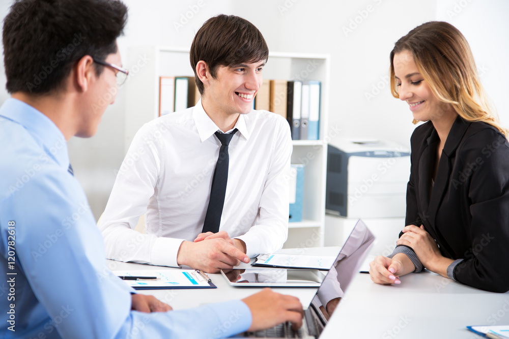 Young businessman with colleagues Young businessman with colleagues