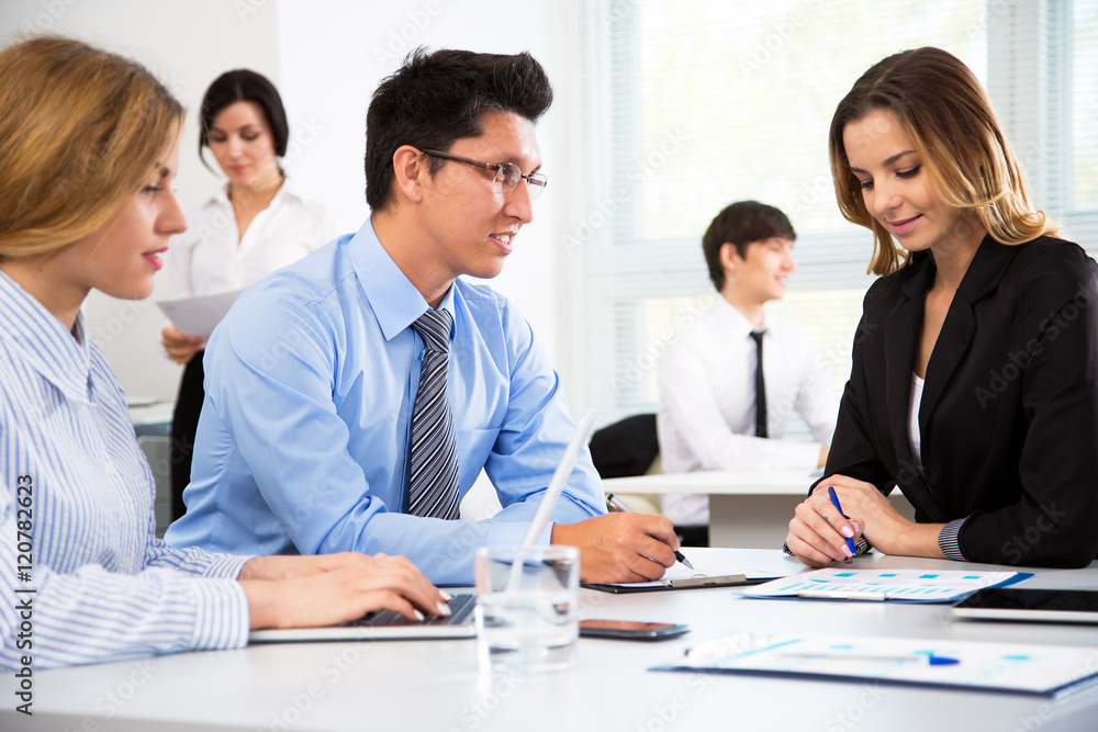 Young businessman with colleagues Young businessman with colleagues