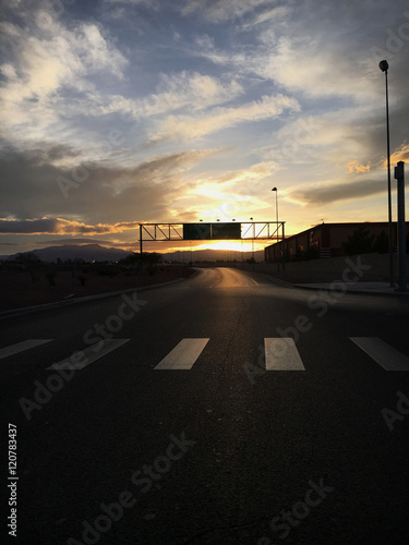 Sunset and signs.  A road sign leaving las vegas USA © andimartin