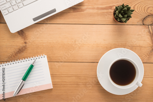   Office table with cup of coffee 