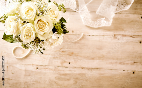 Obraz na płótnie Bridal Bouquet with White Roses and Lace Veil