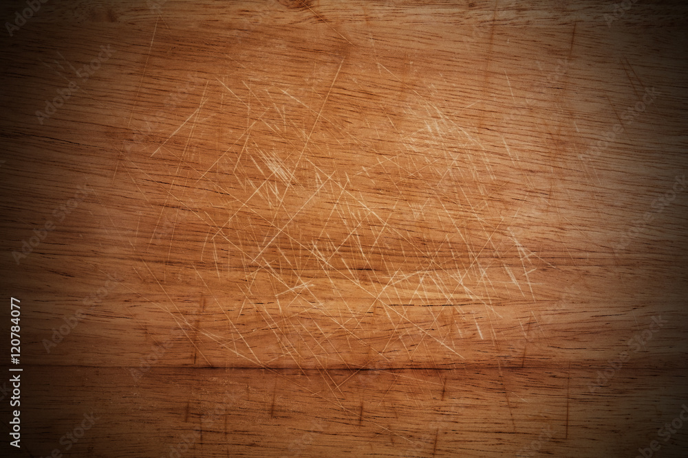 Obraz premium Old scratched wooden cutting board texture