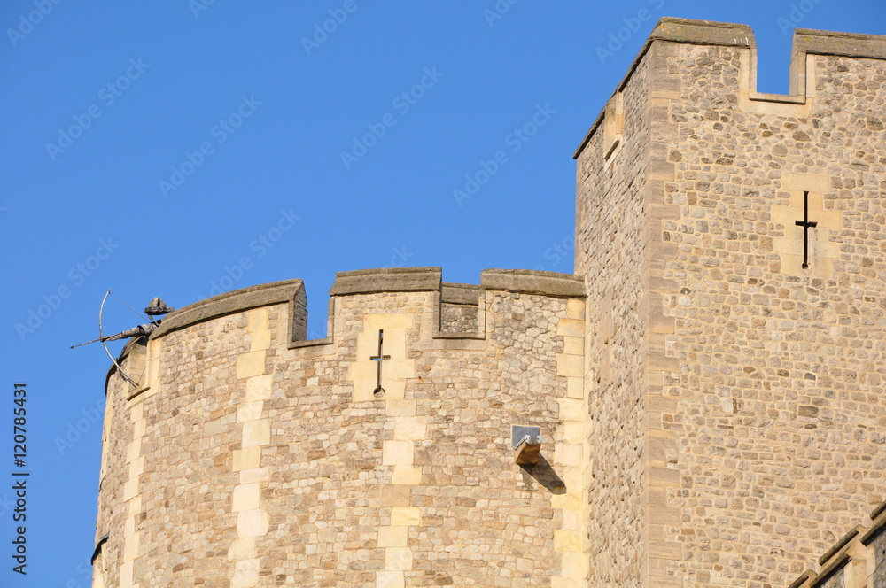Metal archer perched atop a tower in the Tower of London - London, England