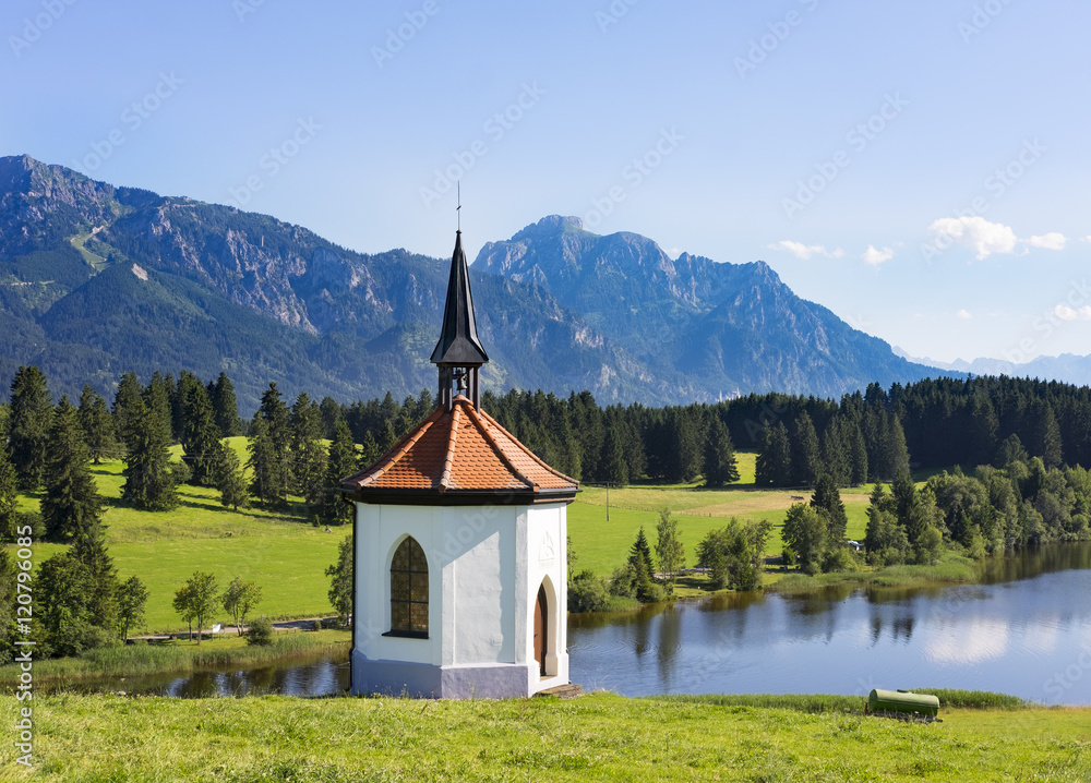 Germany, Bavaria, Allgaeu, Chapel at Hegratsried lake with Germany, Bavaria, Allgaeu, Chapel at Hegratsried lake with