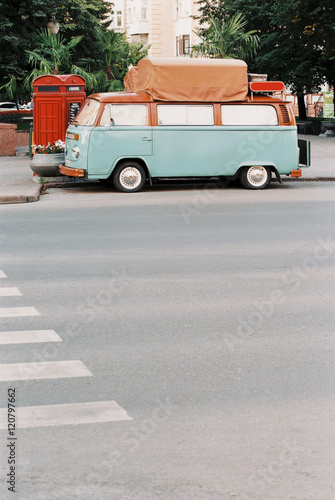 The coffee van (truck) sells of coffee on street. Summer in city