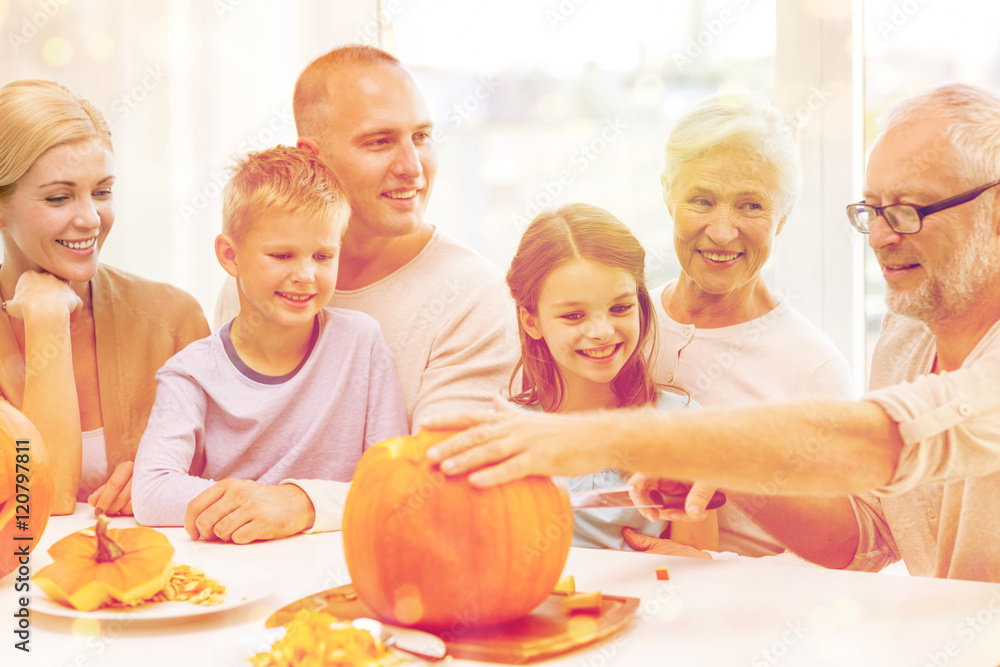 happy family sitting with pumpkins at home happy family sitting with pumpkins at home