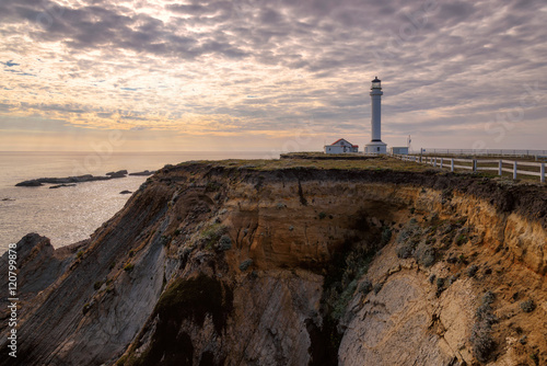 Point Arena Lighthouse at sunset in California 