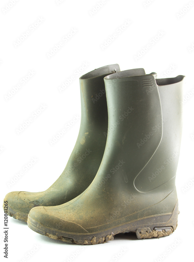 Stivali di gomma sporchi di fango Stock Photo | Adobe Stock