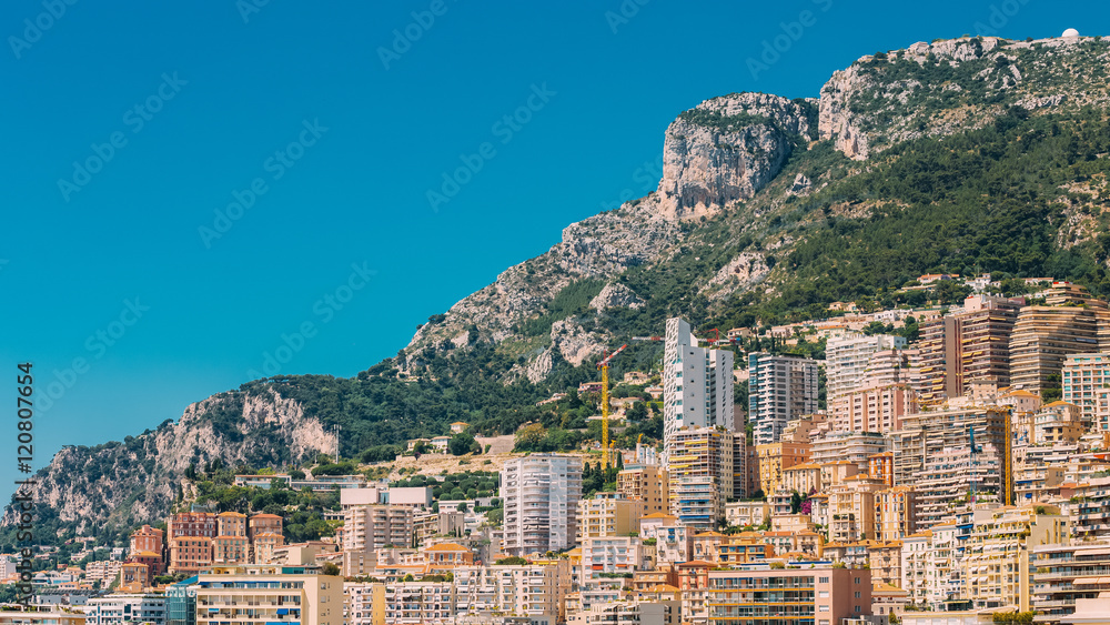 Monaco, Monte Carlo Architecture On Mountain Hill Background.