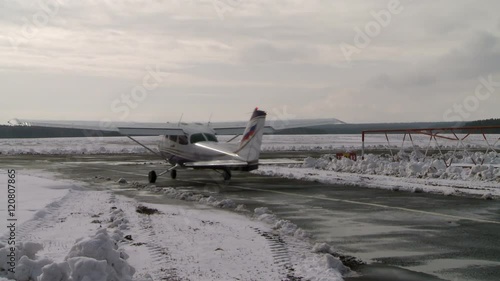 Airplane standing on a runway. photo