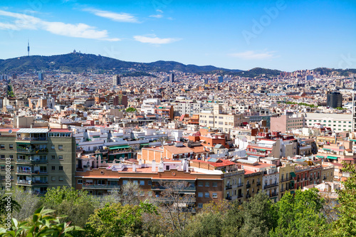 Cityscape / panoramic view of Barcelona and the Tibidabo Mount with the television tower Torre de Collserola and the Expiatory Church of the Sacred Heart of Jesus on it © Esch