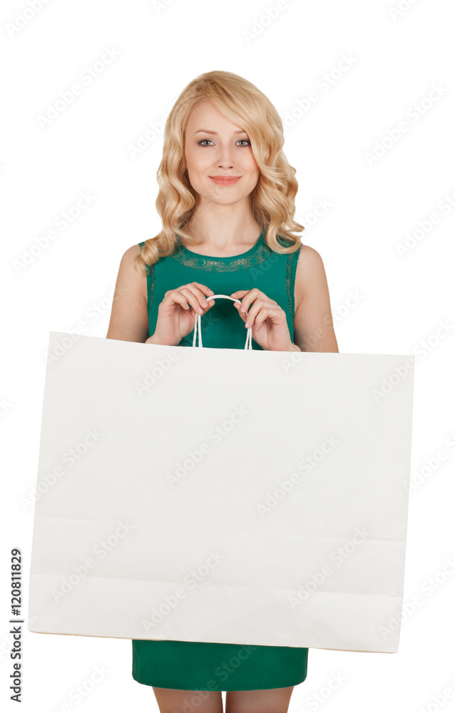 the beautiful blonde in a green dress holds a big package with purchases the beautiful blonde in a green dress holds a big package with purchases